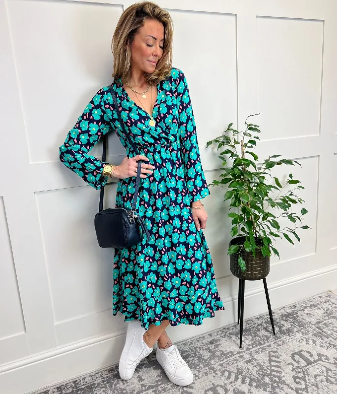 Midi dresses with geometric cutouts for a contemporary and edgy look Green Vibrant Floral Print Wrap Midi Dress Midi dresses with geometric cutouts for a contemporary and edgy look Green Vibrant Floral Print Wrap Midi Dress