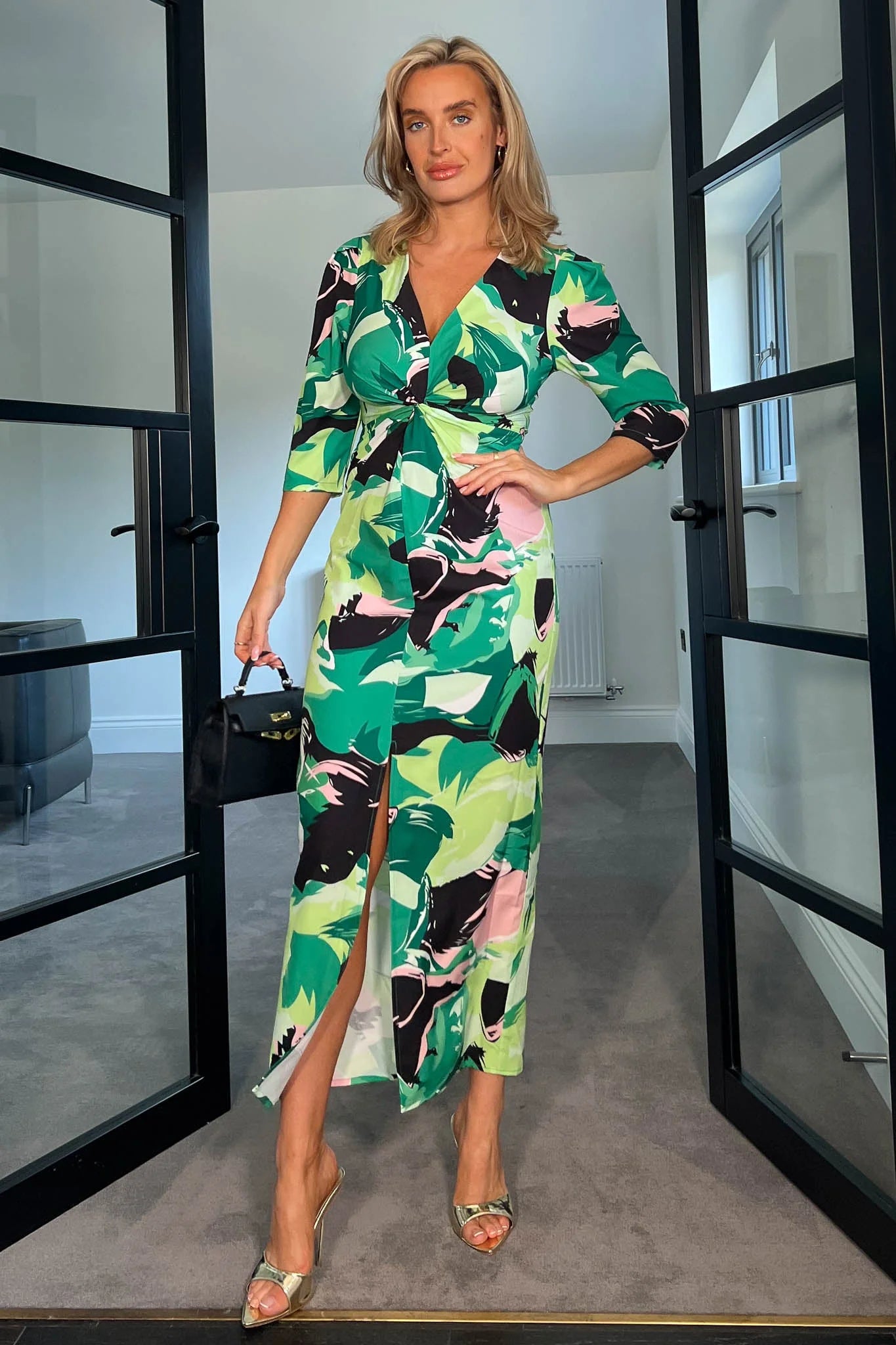 Midi dresses with pom - pom trims for a playful and festive look Donna Green and Pink Floral Twist Front Midi Dress
