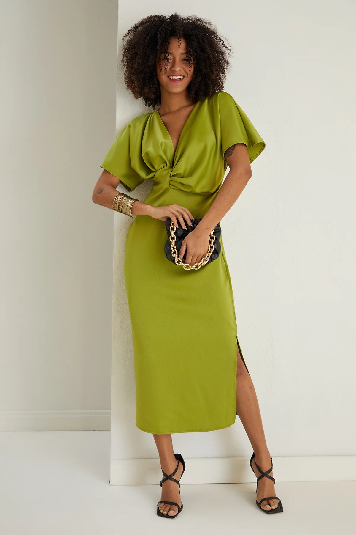 Midi dresses with tiered skirts for a bohemian festival look Farra Lime Green Twist Detail Satin Midi Dress Midi dresses with tiered skirts for a bohemian festival look Farra Lime Green Twist Detail Satin Midi Dress