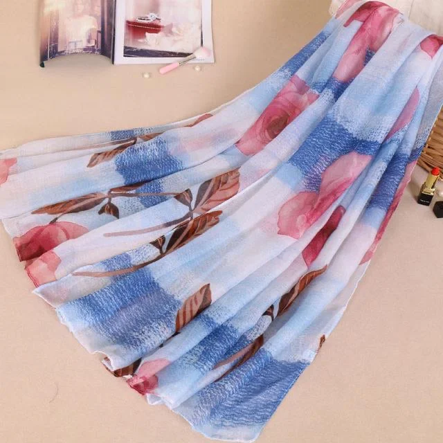 hand knitted women cardigan with artisanal charmBlue Floral Cotton Scarf