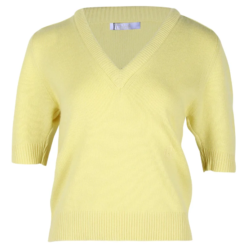 Belted Women's Cotton Blend Sweater Dresses for a Casual LookChloe Knitted V-Neck Top in Pastel Yellow Cashmere Belted Women's Cotton Blend Sweater Dresses for a Casual LookChloe Knitted V-Neck Top in Pastel Yellow Cashmere