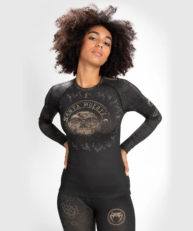Muscle Women T Shirt for a Sporty and Casual LookVenum Women Santa Muerte Dark Side - Rashguard Long Sleeves - Black/Brown Muscle Women T Shirt for a Sporty and Casual LookVenum Women Santa Muerte Dark Side - Rashguard Long Sleeves - Black/Brown