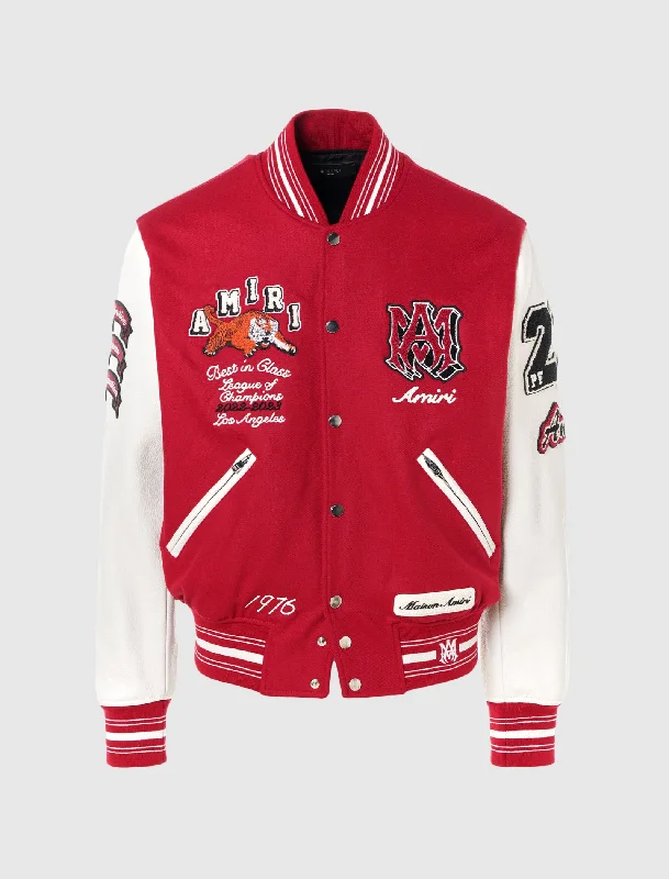Women's cropped leather jackets with a fringe detail for a western - inspired outfitVINTAGE VARSITY BOMBER Women's cropped leather jackets with a fringe detail for a western - inspired outfitVINTAGE VARSITY BOMBER