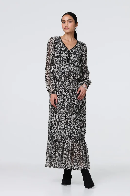 Maxi dresses with a belted empire waist for a more defined and flattering silhouetteLeaf Print Long Sleeve Relaxed Maxi Dress Maxi dresses with a belted empire waist for a more defined and flattering silhouetteLeaf Print Long Sleeve Relaxed Maxi Dress