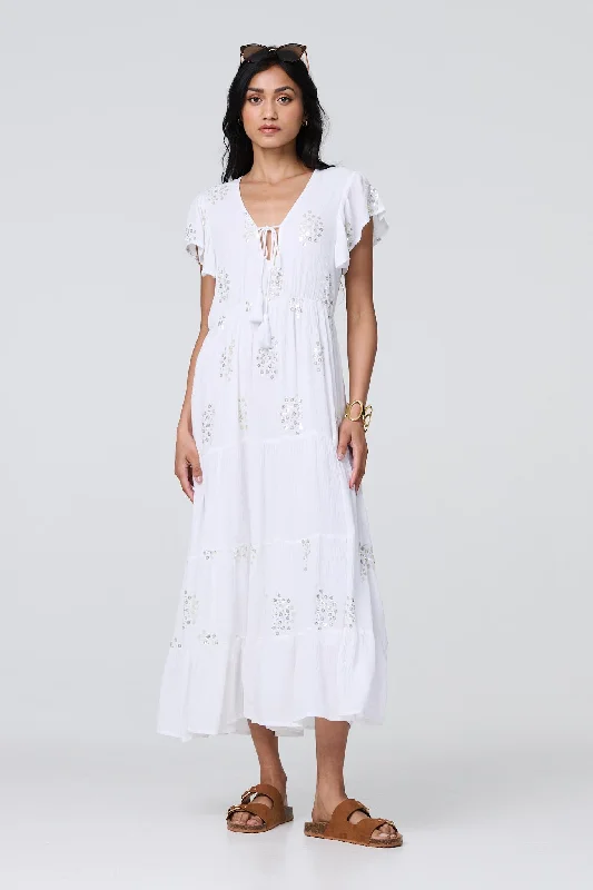 Maxi dresses with fringe trim for a bohemian vibeSequin Detail Tie Neck Relaxed Maxi Dress Maxi dresses with fringe trim for a bohemian vibeSequin Detail Tie Neck Relaxed Maxi Dress