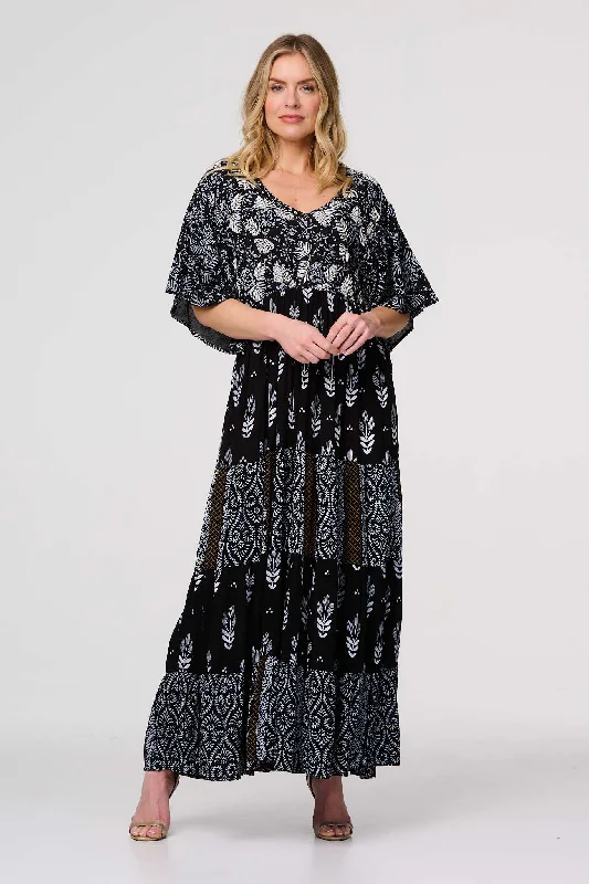 Maxi dresses with a ruched bodice for a more form - fitting and feminine shapeLeaf Print 3/4 Kimono Sleeve Maxi Dress Maxi dresses with a ruched bodice for a more form - fitting and feminine shapeLeaf Print 3/4 Kimono Sleeve Maxi Dress