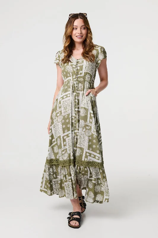 Maxi dresses with a keyhole back for a sexy detailPrinted V-Neck Cap Sleeve Maxi Dress Maxi dresses with a keyhole back for a sexy detailPrinted V-Neck Cap Sleeve Maxi Dress
