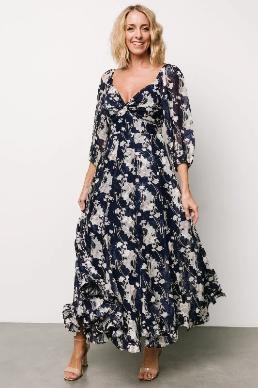 Maxi dresses with balloon sleeves for a vintage - inspired styleEstefania Maxi Dress | Navy + Off White Floral Maxi dresses with balloon sleeves for a vintage - inspired styleEstefania Maxi Dress | Navy + Off White Floral