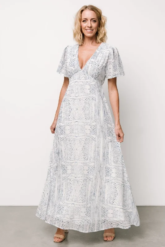 Maxi dresses with pom - pom trims for a playful and festive lookSkyla Deep V Maxi Dress | Blue Print Maxi dresses with pom - pom trims for a playful and festive lookSkyla Deep V Maxi Dress | Blue Print
