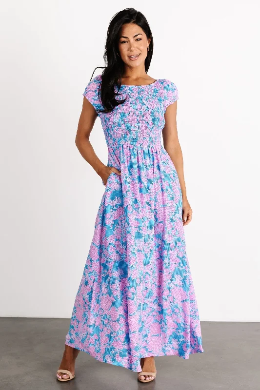 Maxi dresses with tassel accents for a fun and lively touchTabitha Open Back Maxi Dress | Blue + Pink Maxi dresses with tassel accents for a fun and lively touchTabitha Open Back Maxi Dress | Blue + Pink