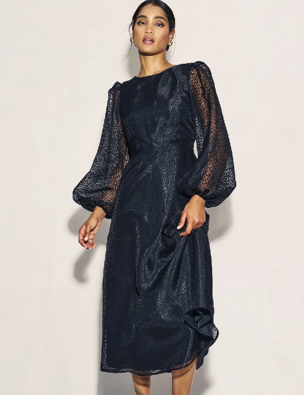 Midi dresses with geometric cutouts for a contemporary and edgy lookBlack Organza Balloon Sleeve Zora Midi Dress Midi dresses with geometric cutouts for a contemporary and edgy lookBlack Organza Balloon Sleeve Zora Midi Dress