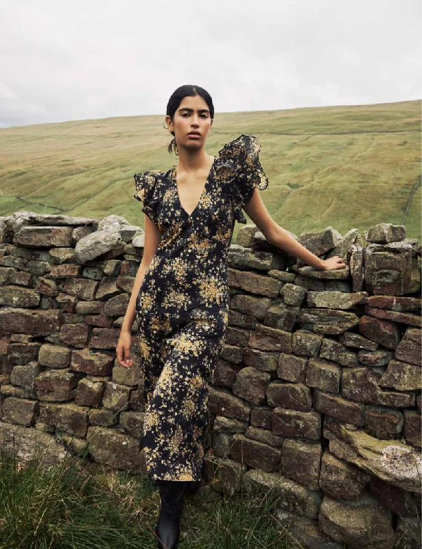 Midi dresses with tiered skirts for a bohemian festival lookBlack Floral Frill Sleeve Layla Midi Dress Midi dresses with tiered skirts for a bohemian festival lookBlack Floral Frill Sleeve Layla Midi Dress