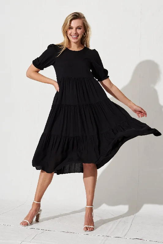 Midi dresses with halter necks for a stylish and comfortable optionNevi Midi Smock Dress In Black Midi dresses with halter necks for a stylish and comfortable optionNevi Midi Smock Dress In Black