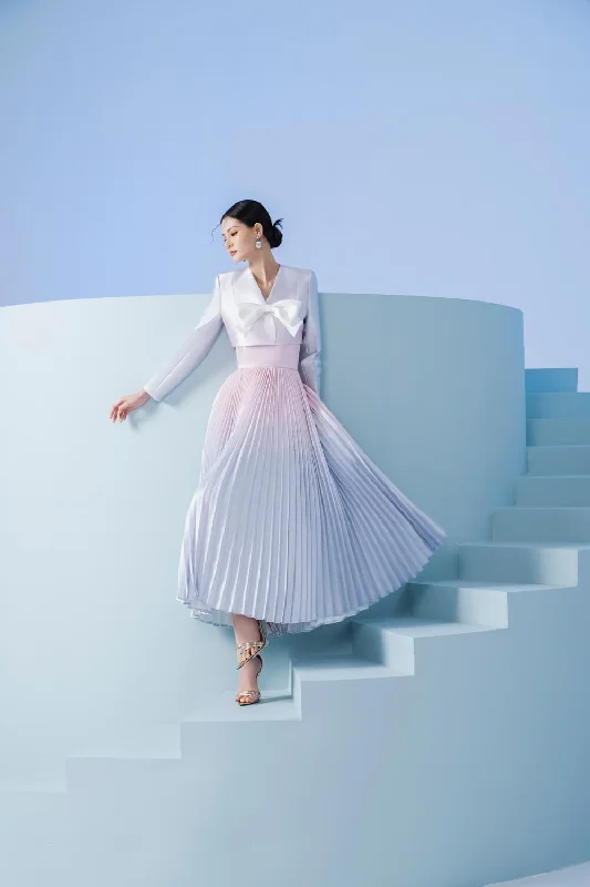 Midi dresses with ruffled sleeves for a more feminine and voluminous lookXenia Bowtie Dress Midi dresses with ruffled sleeves for a more feminine and voluminous lookXenia Bowtie Dress