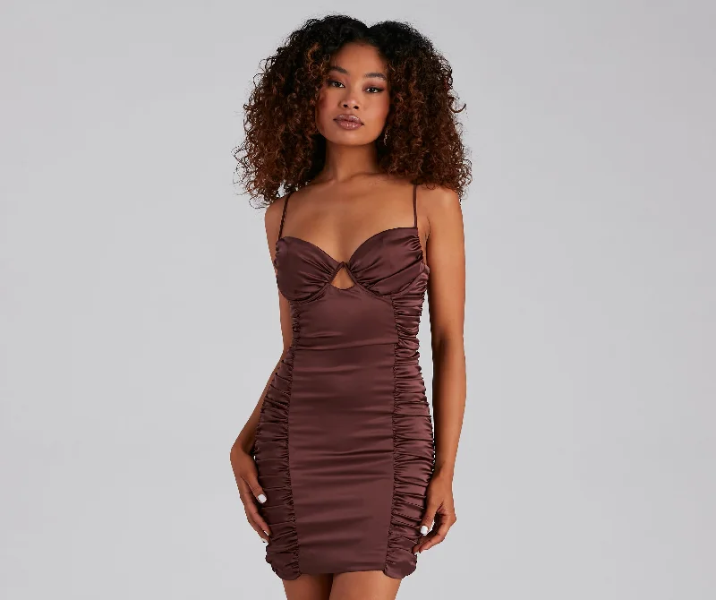 Bodycon dress with a lace - up front​Sparks Fly Ruched Satin Mini Dress