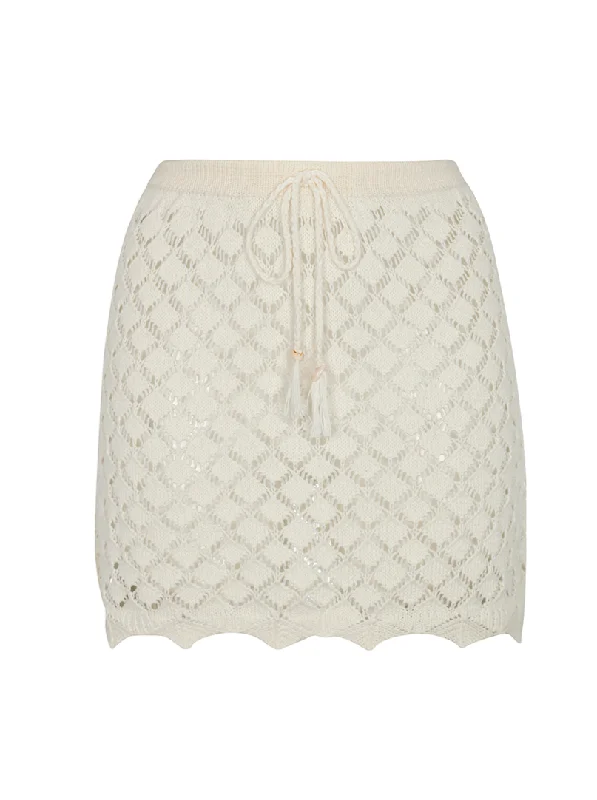 Tunic - style cover ups for a loose and comfortable beach outfitPam Ivory Skirt