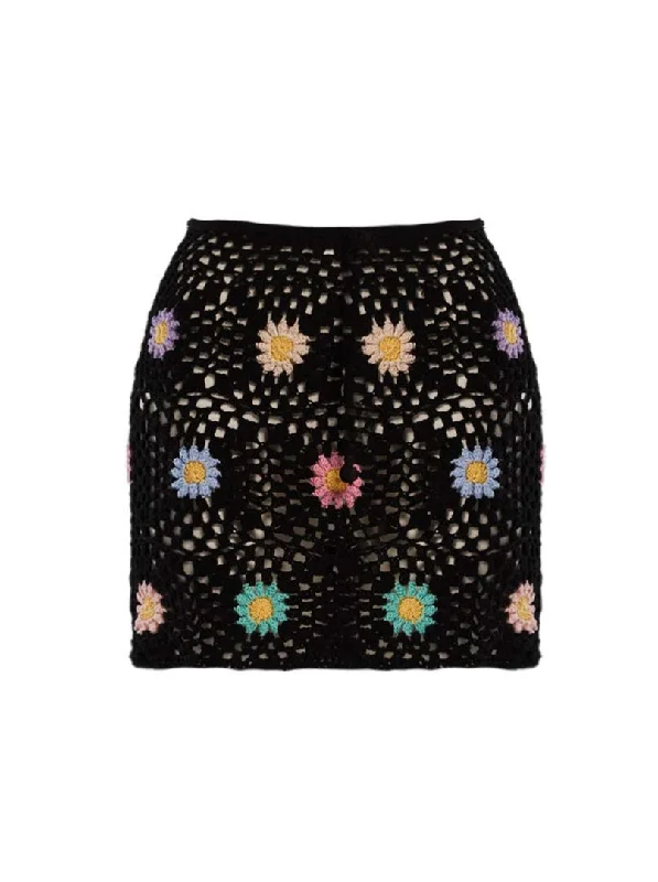 Ruffled - hem cover ups for a cute and feminine lookVivi Black Flowers Skirt
